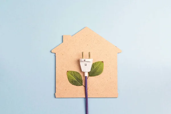 Hus Symbol Med Plugg Som Planta Blå Bakgrund Spara Energikoncept — Stockfoto