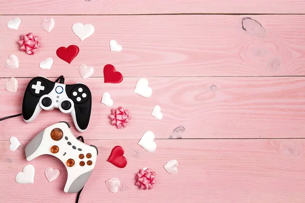Two Joysticks Hearts Copy Space Pink Wooden Background Holidays Romantic — Stock Photo, Image