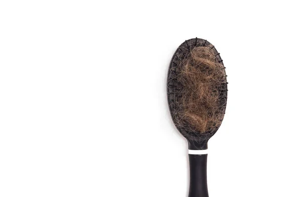 Pettinare i capelli spazzola con perdita di capelli su sfondo bianco. Copia spazio . — Foto Stock
