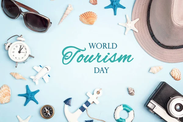 World tourism day background. Flat lay travel concept with vacat