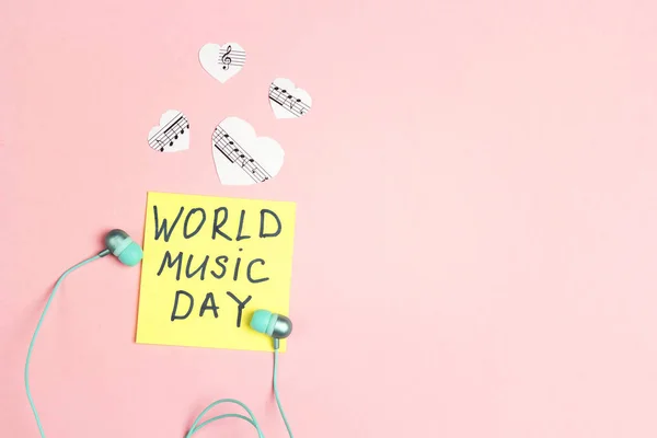International Music Day background with turquoise earphones and