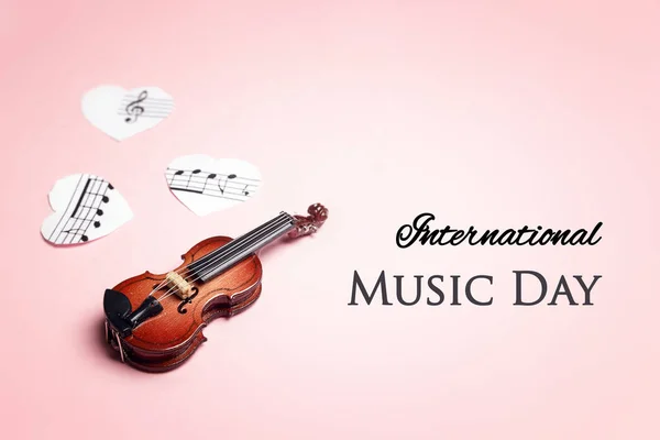 International Music Day background miniature violin and music he