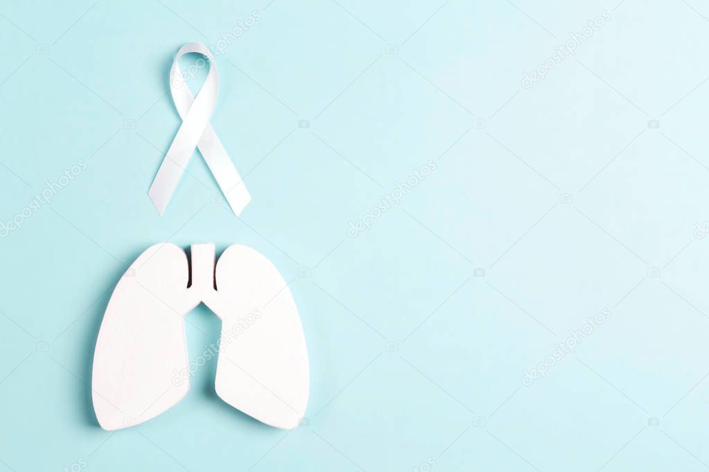 White Lung Cancer Awareness Ribbon And Lung Symbol On Blue Background Copy Space November Lung Cancer Awareness Month Healthcare And Medicine Concept 312552460 Larastock