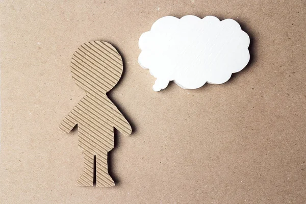 Abstract speaker silhouette with speech bubble on brown paper ba — Stock Photo, Image