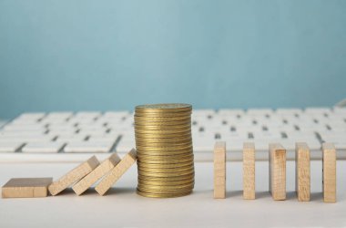 Financial support business concept with Coin Stack and wooden blocks