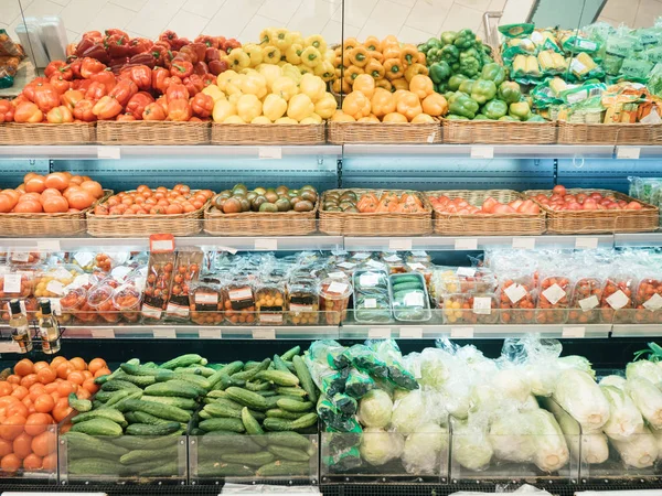 Fresh vegetables on shelf in supermarket. For healthy concept