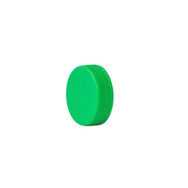 白い背景に分離された緑のプラスチック ボトル キャップ — ストック写真