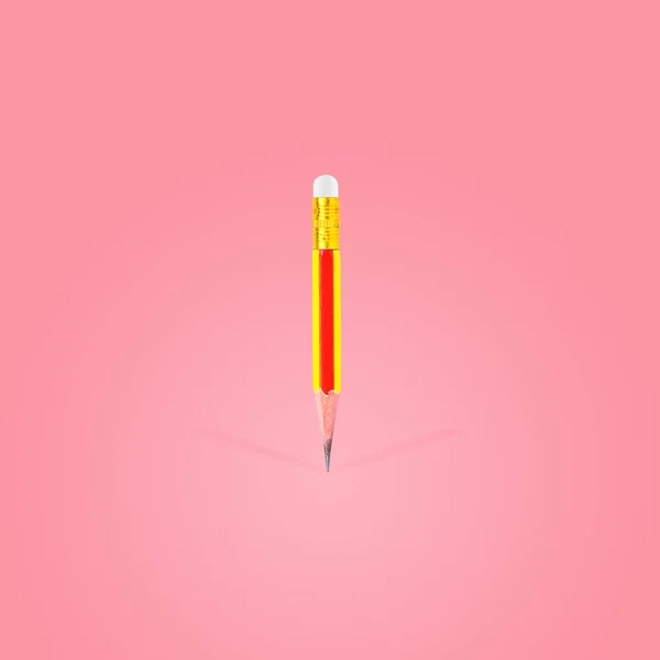 Short-sharpened wooden pencil and eraser isolated — Stock Photo, Image