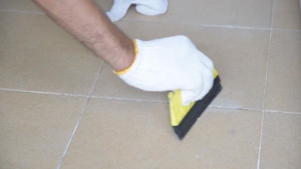 Construction Worker White Gloves Working Grout Tiles Bathroom — Stock Video
