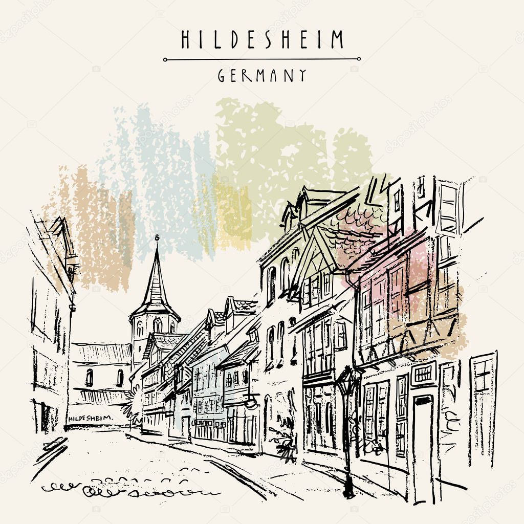 Hildesheim, Germany, Europe. Street in old town. Travel sketch of fachwerk (timbered) houses and church. Vintage hand drawn postcard. Vector illustration