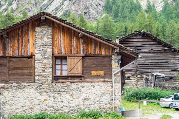 Mountain cottage during summer in a sunny day