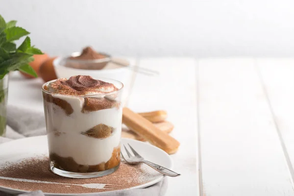 Tiramisu in a glass cup. Horizontal orientation with copy space — Stock Photo, Image