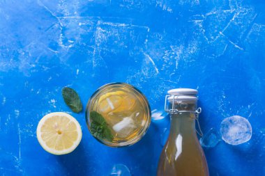 Kombucha lemonade is a fermented drink made from tea and lemon, produced using culture SCOBY clipart