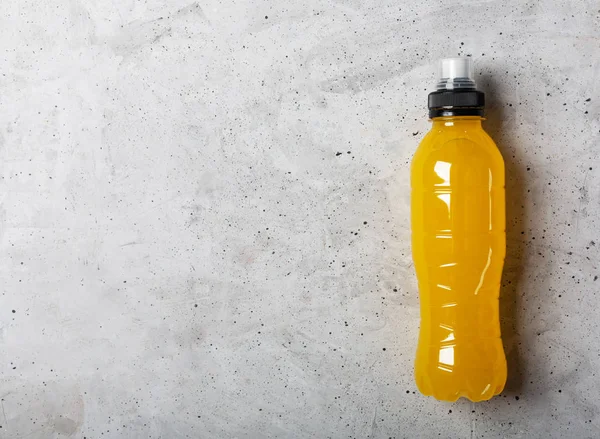 Isotonic energy drink. Bottles with blue transparent liquid, sport beverage on a gray concrete background — Stock Photo, Image