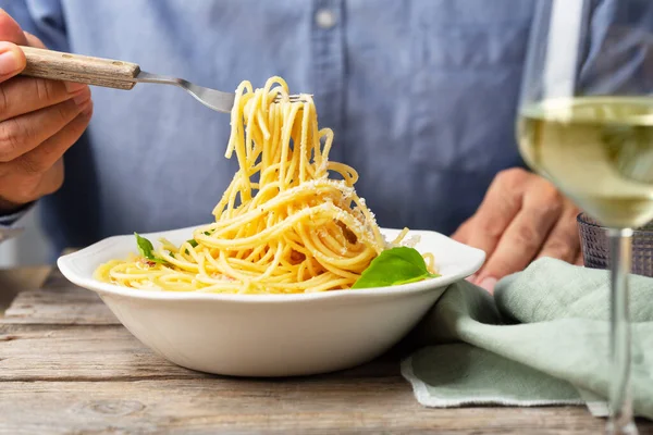 Man Blue Shirt Eating Italian Pasta Carbonara Drinks White Wine — Stock Photo, Image