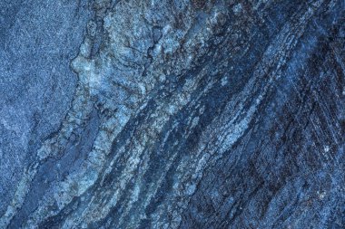 Arka plan veya taş ocağı veya açık döküm mermer duvar dokusu. Mermer taş ya da kaya yüzeyi