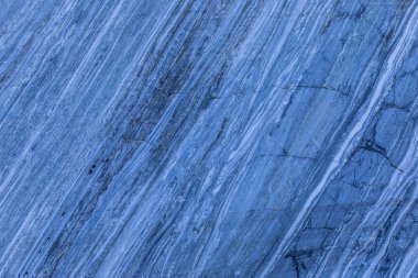 Arka plan veya taş ocağı veya açık döküm mermer duvar dokusu. Mermer taş ya da kaya yüzeyi