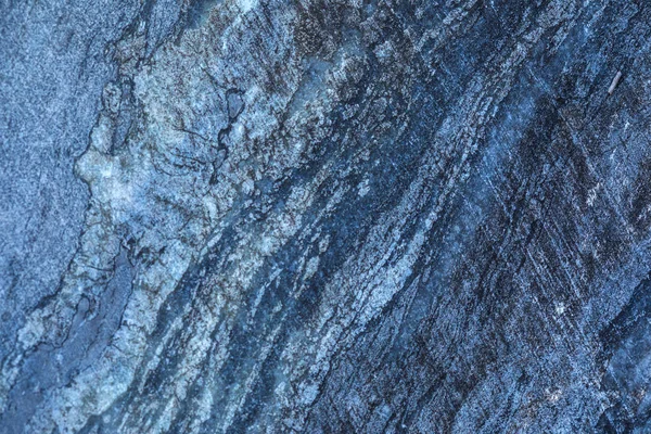 The background or texture of the marble wall of the quarry or opencast. The surface of the marble stone or rock