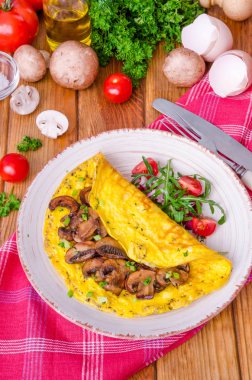 Kızarmış yağlı mantar ve otlar ile omlet