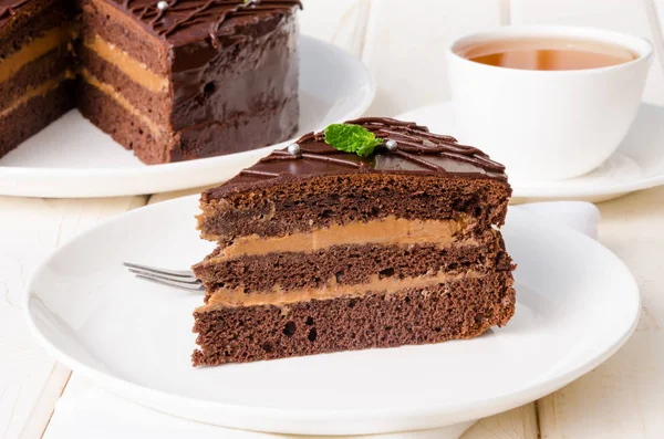 Chocolate layer cake with butter cream. Traditional cake Prague.