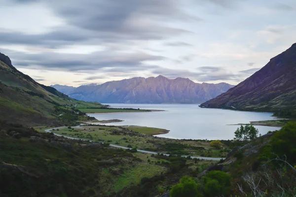Lake Hawea in the middle of the valley in the evening at New Zealand Southland