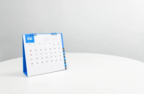 White calendar of June on the white table