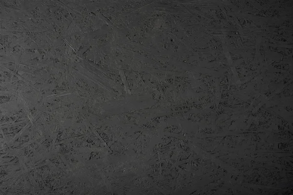 Black painted OSB plate. The image can be used as a background. — Stock Image Black Painted Osb Plate Image Can Used Background Royalty Free Stock Images