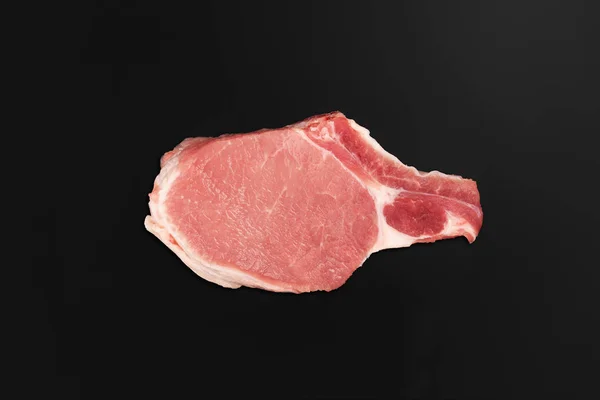 Costilla de lomo de cerdo Hueso-In Chop sobre fondo oscuro — Foto de Stock