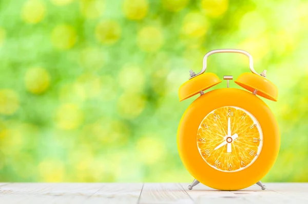 Orange Alarm Clock Wooden Table Blurred Background Fresh Concept — Stock Photo, Image