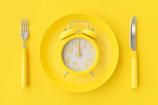 黄色のプレート上の黄色の時計 — ストック写真