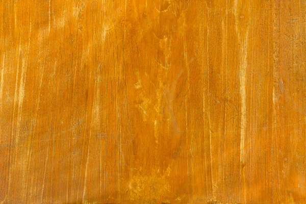 Close up rustic wood table with grain texture in vintage style. Surface of old wood plank in macro concept with empty template and copy space for abstract background or wallpaper and other design.