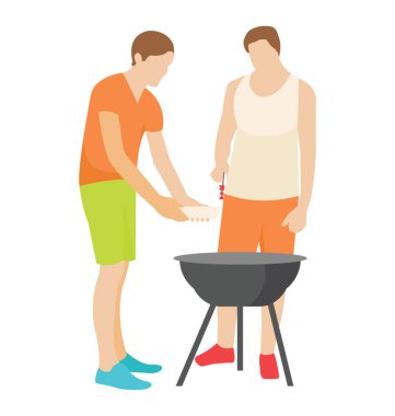 İki arkadaş açık pişirme için ayakta duruyorlar 