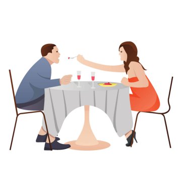 Bir çift, bir akşam yemeğinde eğleniyor 