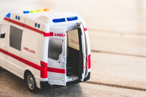Ambulancia puertas fondo salud cuidado juguete de cerca —  Fotos de Stock