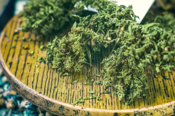 Dried cannabis sativa closeup on a table — Stock Photo, Image