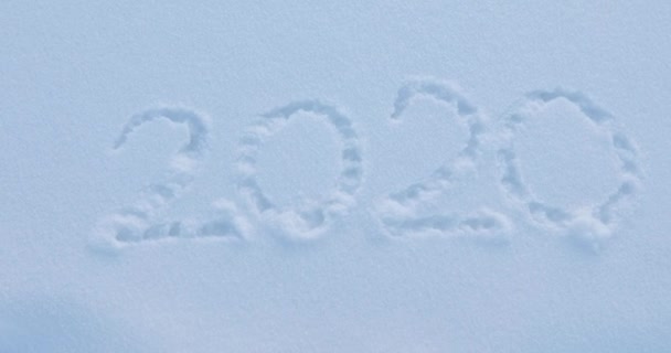 Фігури, що представляють рік намальований сніг — стокове відео