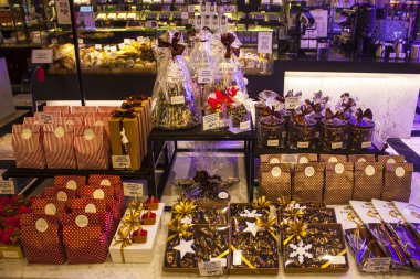 Helsinki, Finland - January 3, 2018: Candies and sweets in famous confectionery Fazer on Kluuvikatu Street in Helsinki clipart