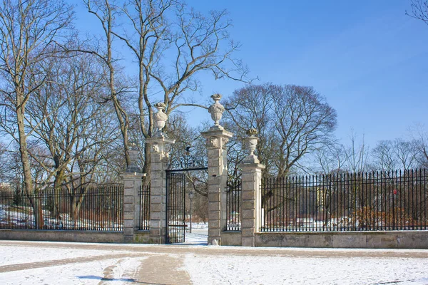 Entarnce in French-style garden of Baroque style Krasinski Palace in winter in Warsaw, Poland