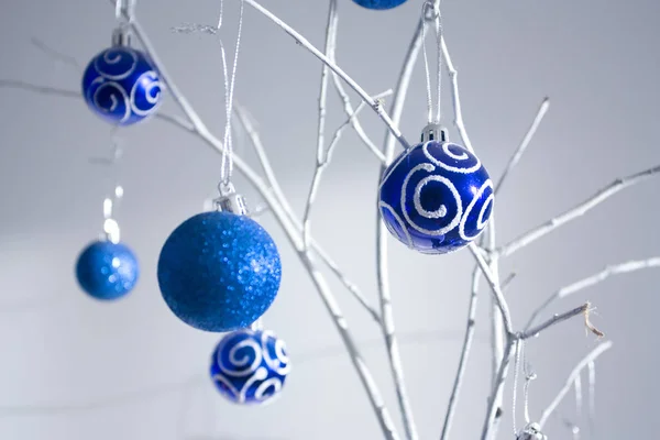 Elegant Christmas Composition Blue Baubles White Branch White Background — Stock Photo, Image