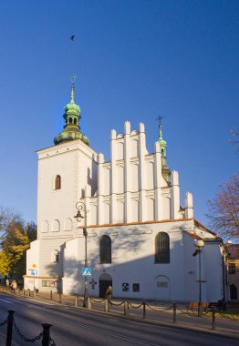 LUBLIN, POLAND - October 15, 2018: Church of the Assumption of Our Lady of Victory in Old Town of Lublin clipart