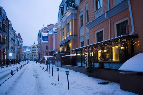 Kyiv, Ukraine - January 6, 2019:  Architecture of Vozdvizhenka district in Old Town of Kiev at winter