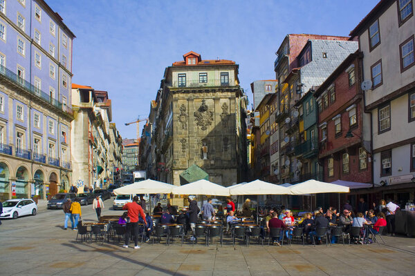 PORTO, PORTUGAL - March 3, 2019: Fonte da Praca da Ribeira - the fountain overlooking the central Praca da Ribeira with the sculpture made by St. John Baptist in Porto