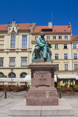 WROCLAW, POLAND - June 18, 2019: Old Statue of the Polish poet, playwright and comedy writer Aleksander Fredro on the Market Square in front of the Town Hall of Wroclaw