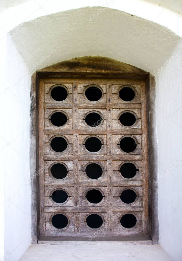 Ancient wooden window in  Spaso-Preobrazhensky male monastery in Novgorod-Seversky, Ukraine