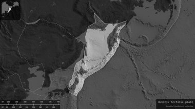 Okhotsk plaka şekli, bilek haritasının karanlık ve doyumsuz arkaplanında, bilgilendirici örtülerle özetlenmiştir. 3B görüntüleme