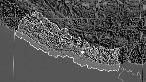 Nepal outlined on the bilevel orthographic map. Capital, administrative borders and graticule