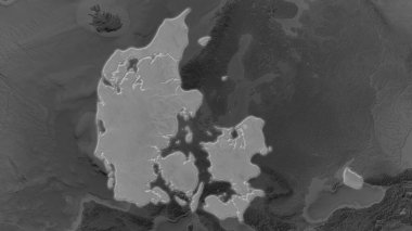 Danimarka çevresinin koyu bir arka planında büyümüş ve parıldamıştır. Gri tonlama çarpışan yükseklik haritası