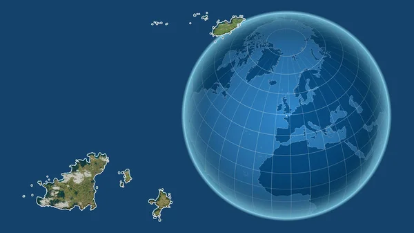 건지입니다 지도의 배경에 고립되어 나라의 지도와 대조되는 모양을 지구본 — 스톡 사진