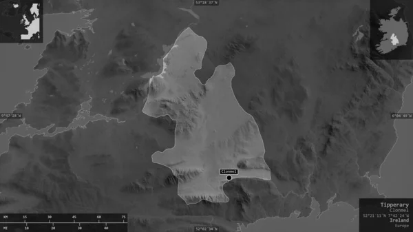 Tipperary, county of Ireland. Grayscaled map with lakes and rivers. Shape presented against its country area with informative overlays. 3D rendering