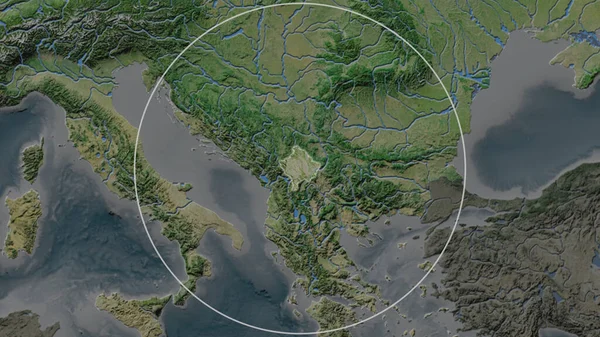 科索沃扩大的地区在其邻近地区的背景上被一个圆圈所包围 卫星图像 — 图库照片